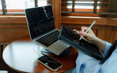 A female investor analyzes past trends, sets goals, diversifies assets, and manages risks to ensure...