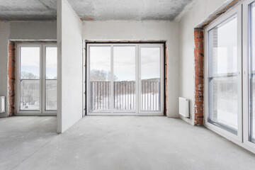 interior of the apartment without decoration in gray colors. rough finish