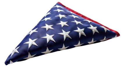 Folded American flag presented as a symbol of honor on white background.