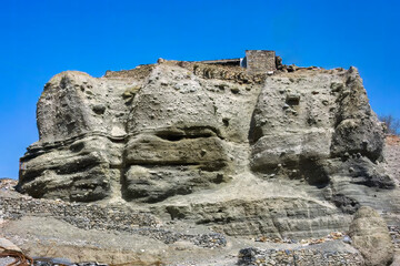 Sherpa Stone House on Eroded Rock Formation in Manang, Nepal.