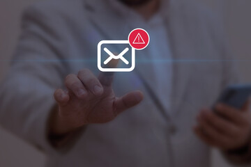 Email error and delivery failure concept. Businessman touching a mail icon with a red warning sign, symbolizing blocked messages, spam detection, or system issues in digital communication.