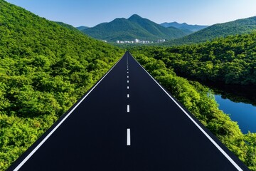 Fototapeta premium A scenic road surrounded by lush greenery and distant mountains in bright sunlight.