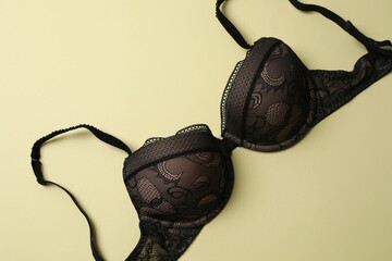Flat lay with women romantic underwear on beige background, top view