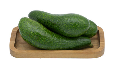 Fresh avocado in wooden tray on transparent background