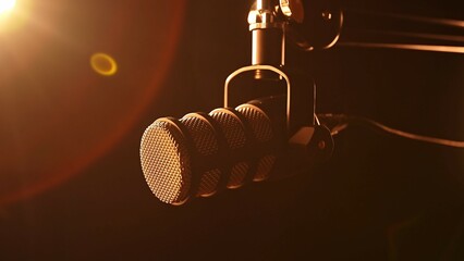 Professional studio microphone in warm cinematic lighting