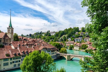Explore the charm of Lucerne, Switzerland, showcasing the Reuss River and the famous Chapel Bridge. A perfect destination for travelers seeking stunning views and rich culture.