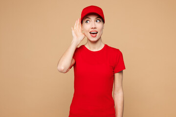 Professional delivery girl employee woman wear red cap t-shirt uniform workwear work as dealer...