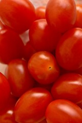 Red fresh cherry tomatoes in a bowl