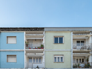 Close-up of traditional ceramic tile covered facades of residential apartment buildings in Braga in...