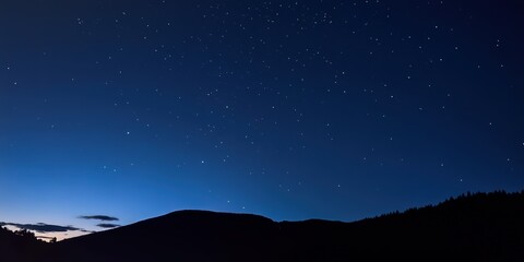 Stunning night landscape featuring the bright Milky Way galaxy over majestic mountains. A breathtaking starry sky perfect for nature, astronomy, and adventure themes.