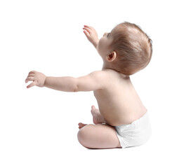 Adorable little baby sitting on white background