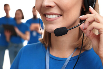 Technical support call center. Smiling operator on white background, closeup