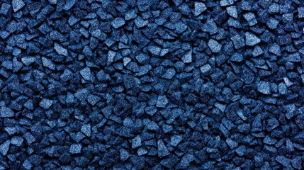 Fototapeta premium Close-up view of textured blue gravel stones, ideal for landscaping and construction uses
