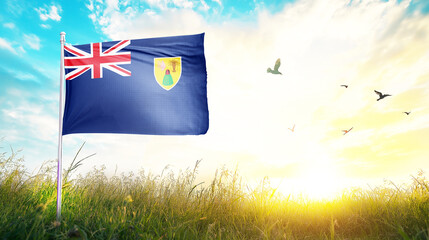 Turks and Caicos Islands flag textile cloth fabric waving on the top sunrise mist fog