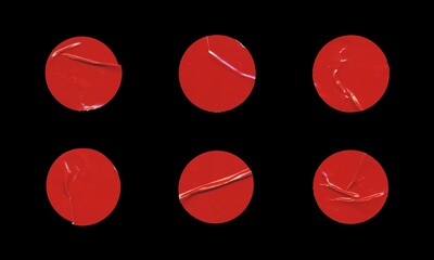 Set of six red glossy paper circles with creases, blank round sticker on black background