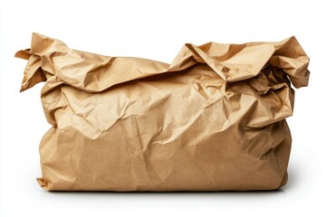 Obraz premium Crumpled paper bag, still life, on white background. Mockup, packaging design