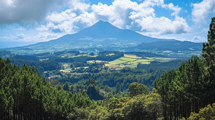 Obraz premium Majestic Volcano Landscape with Lush Green Valley