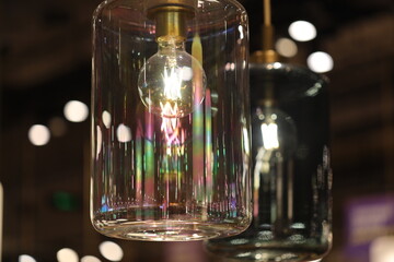 A close-up shot of a light hanging from a ceiling, great for interior design or technology illustrations.