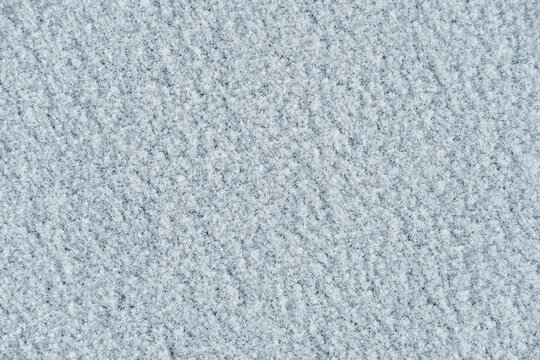 Close-up of snow texture in ski resort