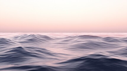 Fototapeta premium Serene ocean waves with soft pastel sky at dawn or dusk scenery