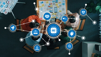 A team collaborates in a modern workspace focused on artificial intelligence concepts. The image showcases brainstorming and digital design elements for innovative strategies. Amity