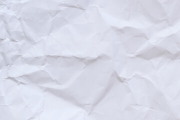 Crumpled white paper background. Crumpled white paper texture or paper background. Light background with copy space. Top view