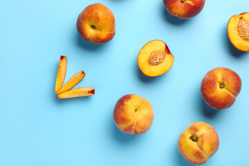 Sweet peaches on blue background