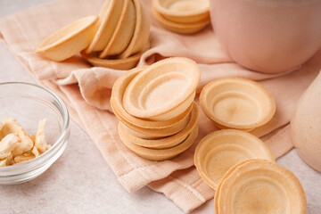 Homemade tartlets on light background