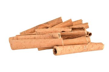 A pile of dry cinnamon sticks lies on a PNG background