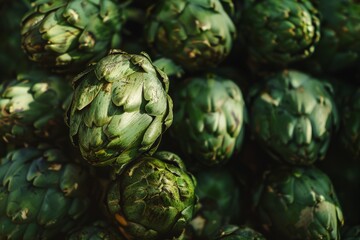Fototapeta premium Freshly Stacked Artichokes Highlighting Textures and Green Hues