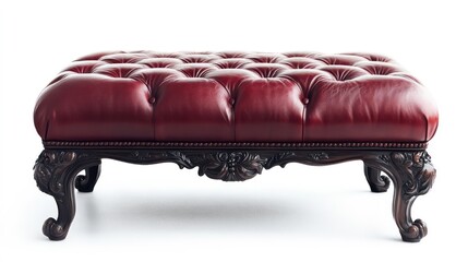 A luxurious red leather ottoman with deep button tufting and ornate carved wooden legs. Perfect for adding a touch of classic elegance to any living space. (White background)