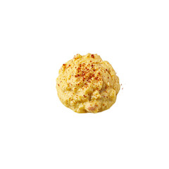 Delicious deviled egg with creamy yolk filling and paprika garnish isolated on white Rich in flavor and perfect for food concepts