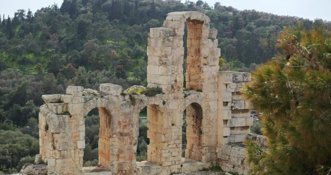 Detail of Odeon theatre wall ancient ruins on Acropolis in Athens, Greece