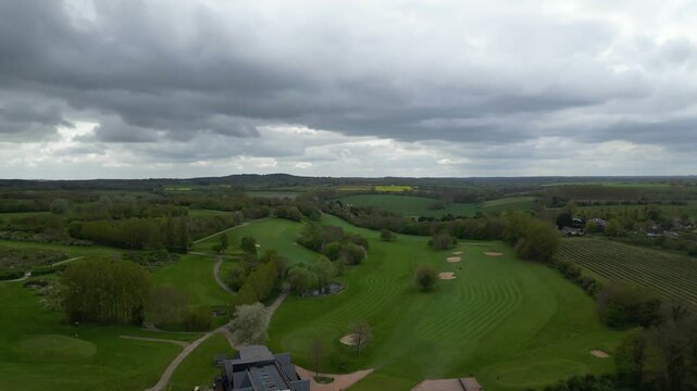 High Angle British Agricultural Farms at Gorgeous Countryside Landscape of England Great Britain of United Kingdom. Footage Was Captured with Drone's Camera from Medium High Altitude