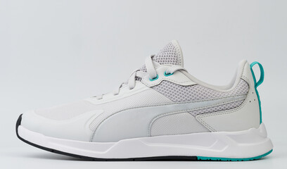 Side view of white sport shoe