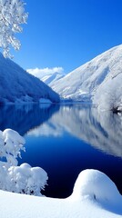 A serene winter landscape featuring snow covered mountains and water