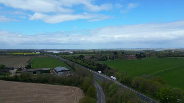 High Angle British Agricultural Farms at Gorgeous Countryside Landscape of England Great Britain of United Kingdom. Footage Was Captured with Drone's Camera from Medium High Altitude