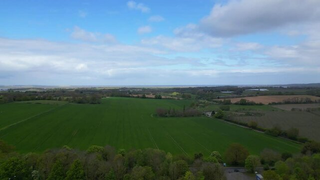 High Angle British Agricultural Farms at Gorgeous Countryside Landscape of England Great Britain of United Kingdom. Footage Was Captured with Drone's Camera from Medium High Altitude