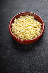 mozzarella cheese for pizza grated cheese fine fresh tasty food dish delicious gourmet food background on the table rustic food top view copy space