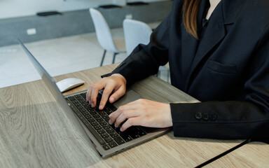 A female investor analyzes past trends, sets goals, diversifies assets, and manages risks to ensure...