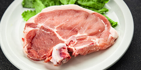 Pork on bones raw meat fresh tasty food dish delicious gourmet food background on the table rustic food top view copy space