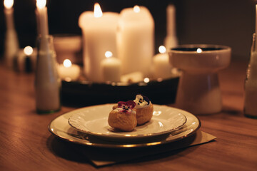 a glass of champagne and a snack