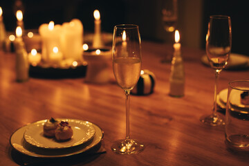 a glass of champagne and a snack