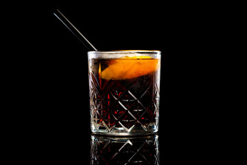 Negroni cocktail in a glass on a black background