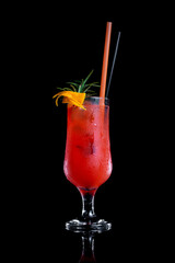 Cocktail Sex on the Beach in a glass on a black background