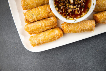Nem rolls food sauce vietnamese rice paper roll gourmet background on the table rustic food top view copy space