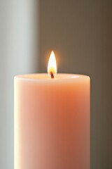 Soft glow from candle illuminates tranquil setting with gentle s