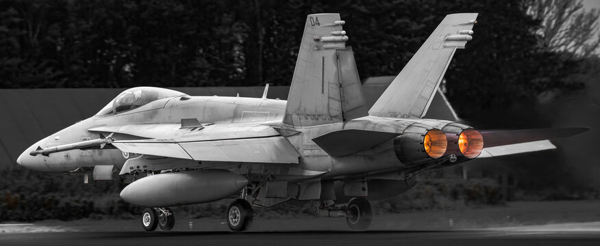 F-18 fighter jet Finish Airfare roaring down the runway of Leeuwarden.
