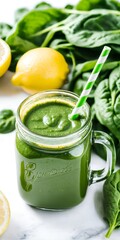 Fototapeta premium Green spinach smoothie with lemon. Detox, clean diet. Vegetable drink.