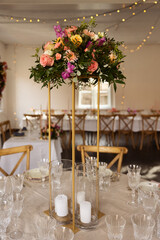 Wedding table setting with flowers.